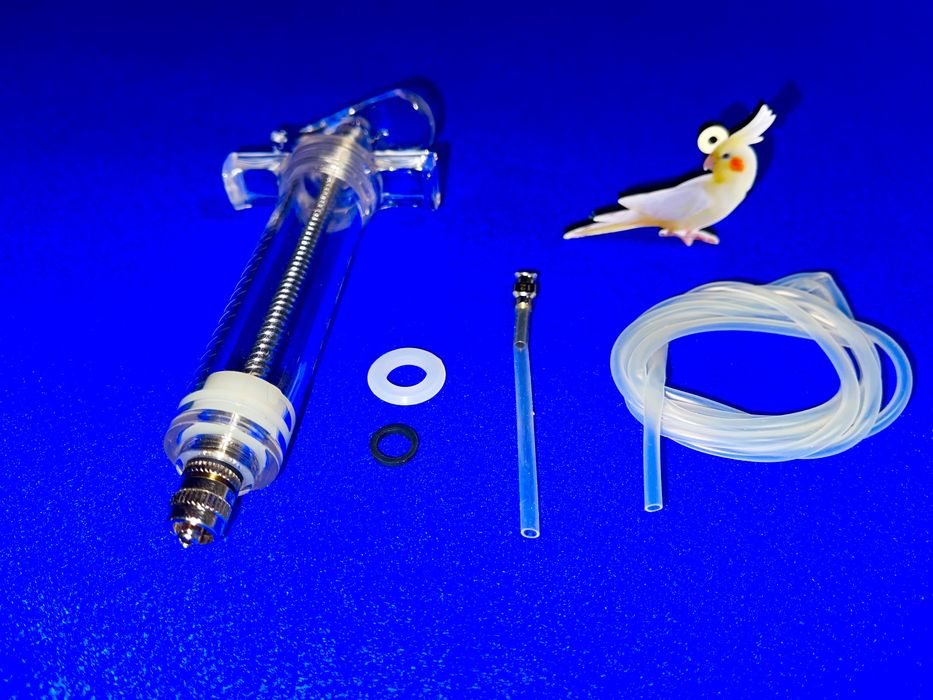 Seringas e ponteiras para aves de medio porte