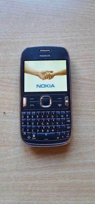 Nokia 302 z ładowarką