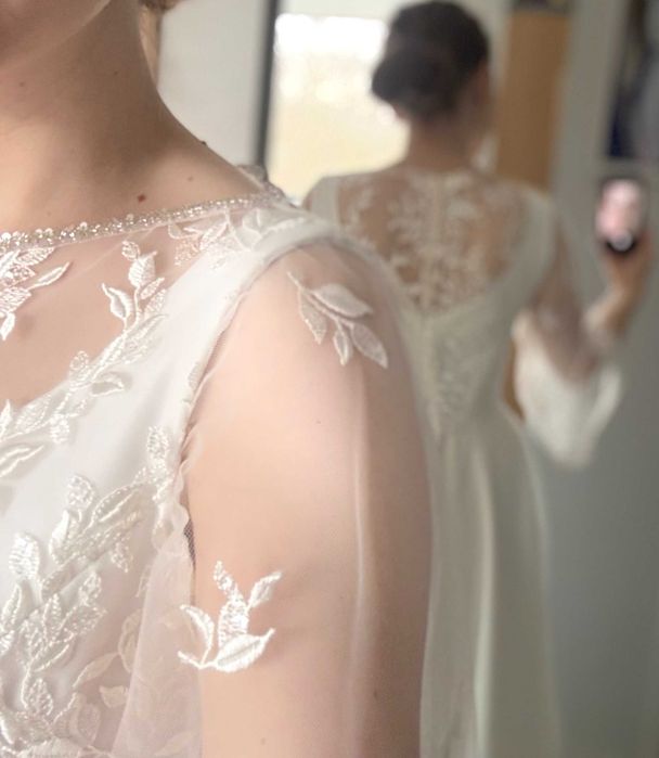 Nowa, klasyczna  suknia ślubna