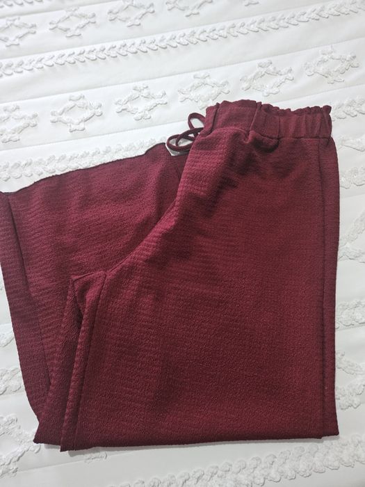 Calça pantalona.
