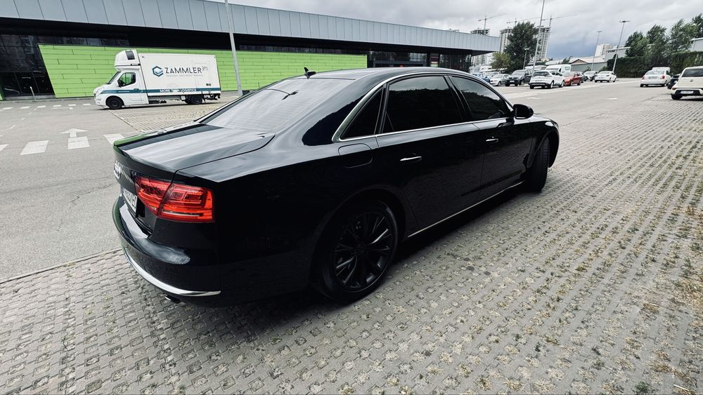 Audi A8 2013 VIN WAURGAFD4DN030630 фото оголошення 4 з 11