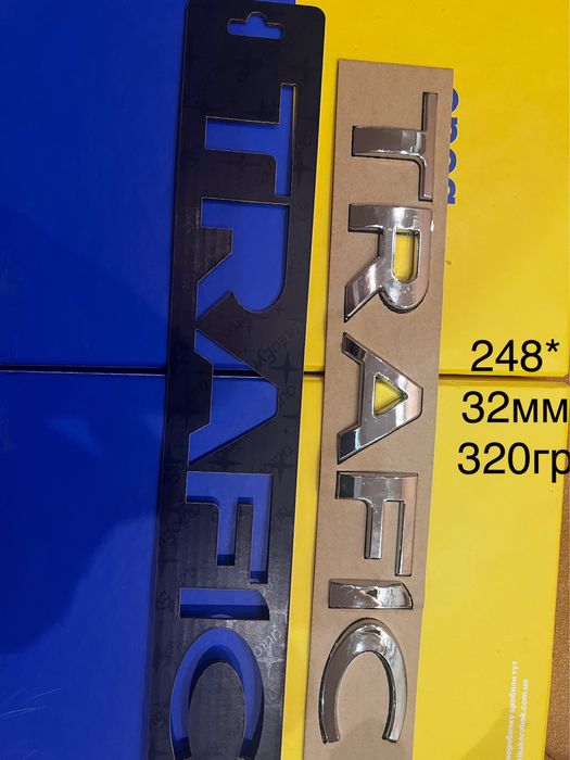 Емблема Dacia Logan120*95мм передня з 2004 р.,напис рено ,трафик.