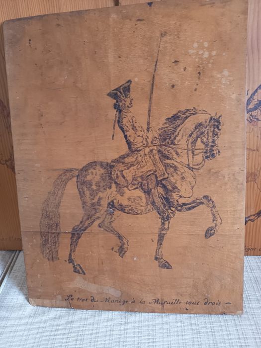 Gravuras equestres em madeira