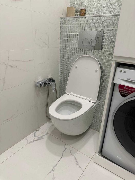 Унітаз підвісний RAK Ceramics Sensation SENWC1446AWHA з кришкою