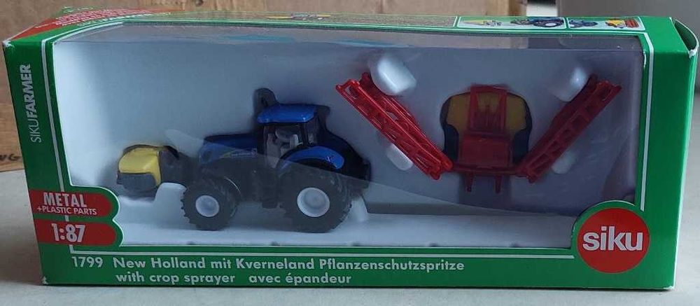 Trator  New Holland T7070 com Pulveizador Kverneland - SIKU 1799