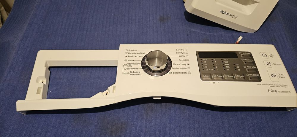 Części pralki Samsung WF600B0BKWQ szuflada i panel sterujacy.