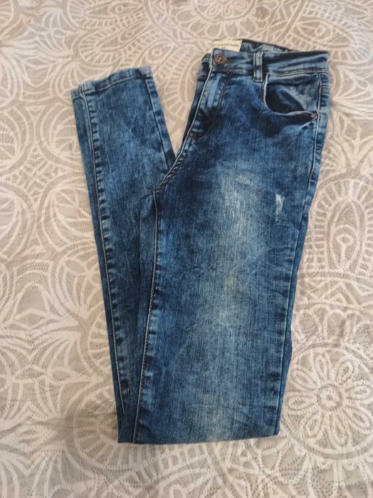 Damskie jeansy Reserved