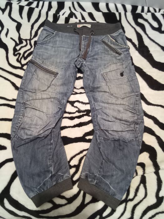 Spodnie joggery męskie River Island