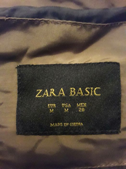 Женский пуховик Zara.