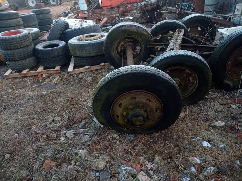 Oś z kołami i zaczepem pod Mauzer itp