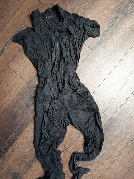 Czarny kombinezon damski MOHITO