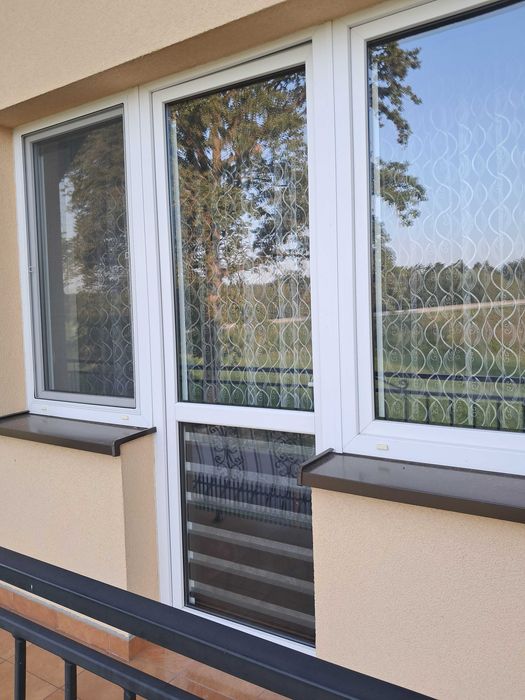 Sprzedam używane drzwi balkonowe plastikowe kompletne 87x230