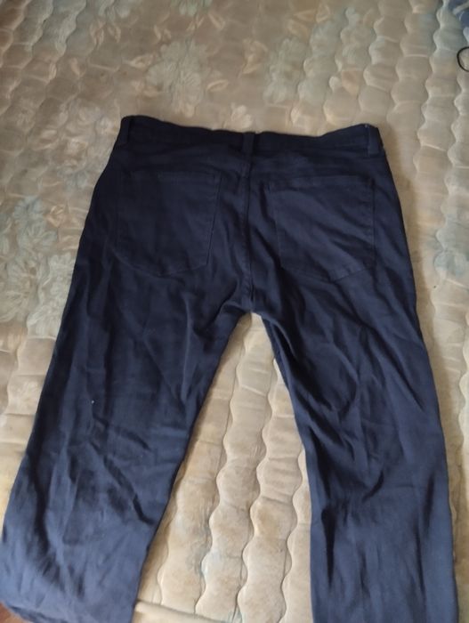 Calças de ganga azuis escuras