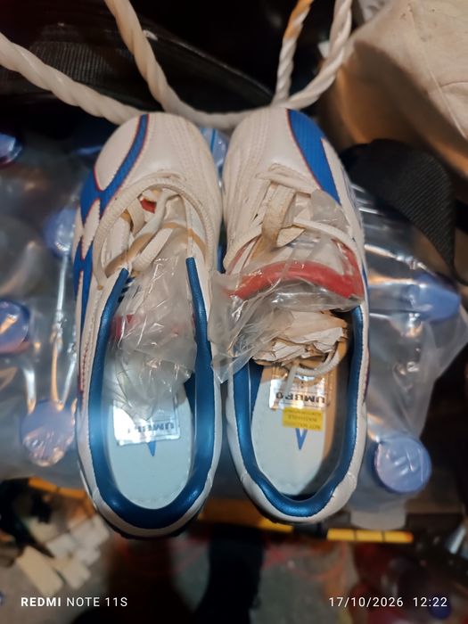 Chuteiras n 32,5 Umbro como novas
