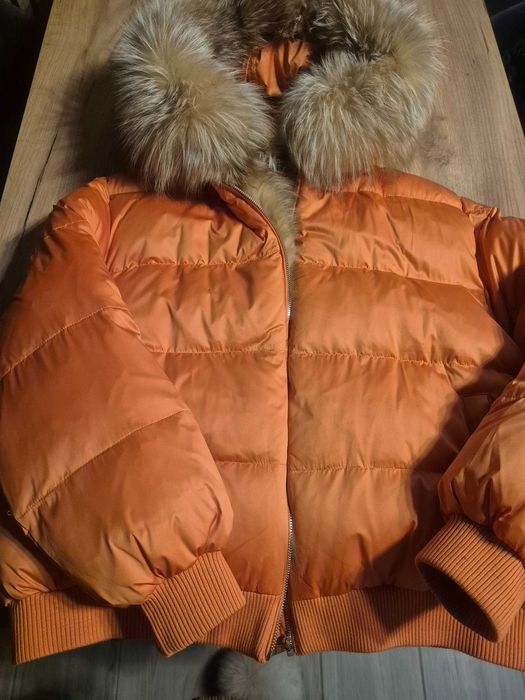 Куртки, пуховікі жіночі