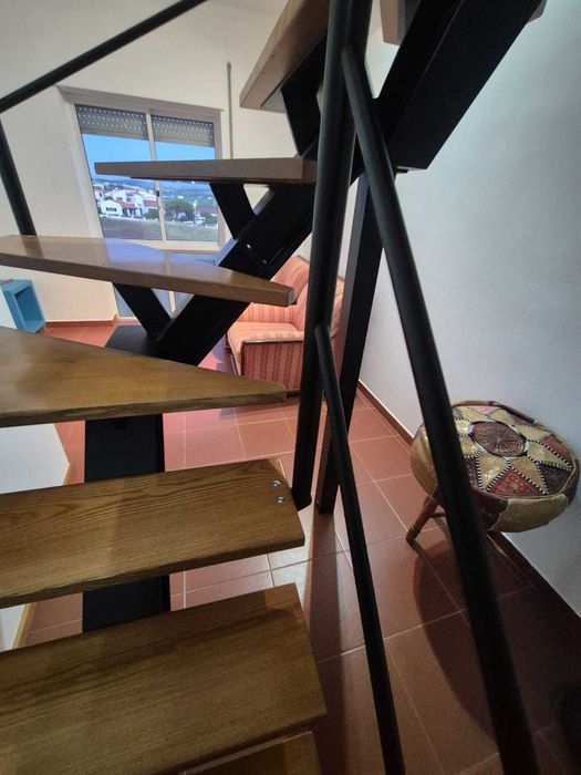Escada "caracol" interior