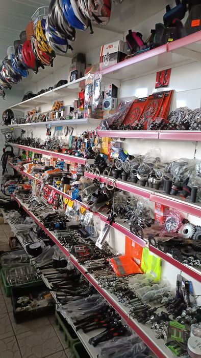 Велосипеди та запчастини