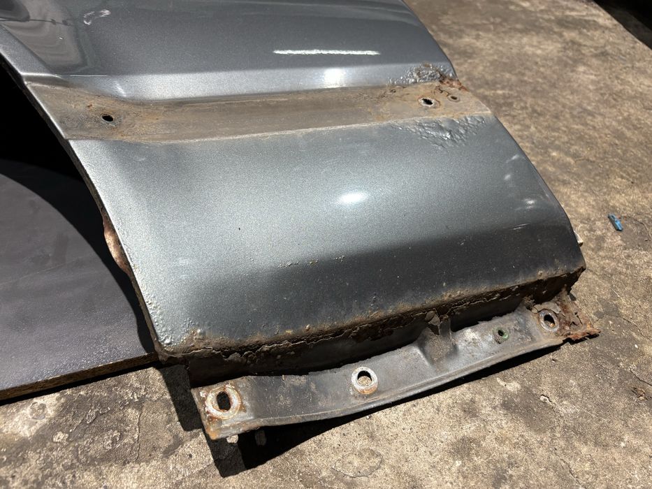 Błotnik lewy przód BMW E32 delphin