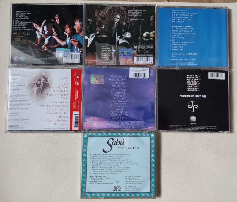 Диски CD. Rammstein. Queen. Rainbow. Rhapsody. Robert Plant. Saxon...