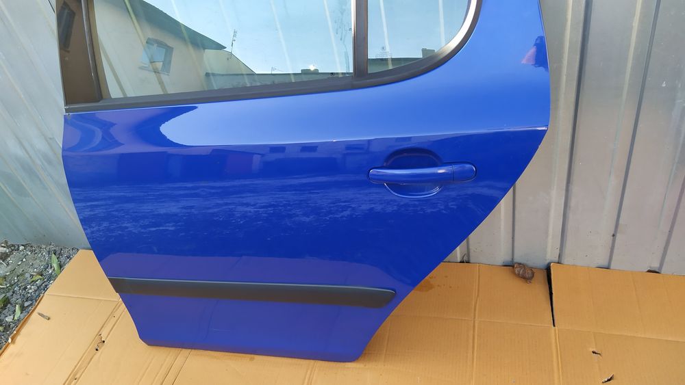 Drzwi lewe tylne lewy tył Skoda Fabia II 2 HB kolor 4590 LF5K