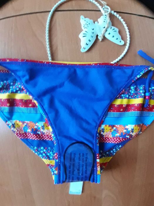 Яскраві плавки від купальника, 12 розмір.
Red Herring