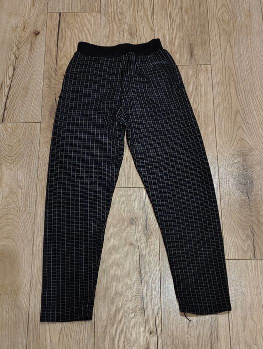 Spodnie dziewczęce czarne w kratkę 152-158