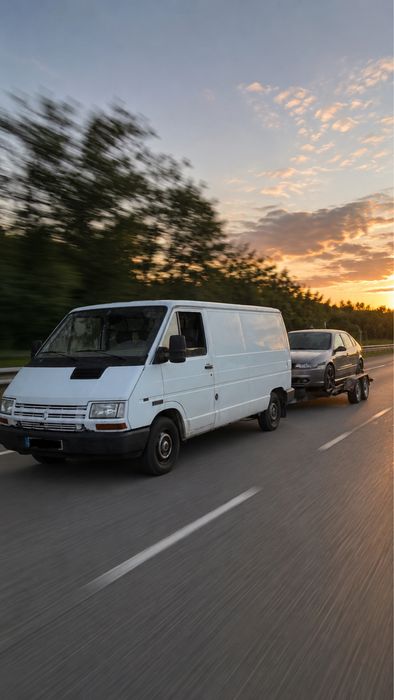 Serviços de transporte de veiculos e mercadorias