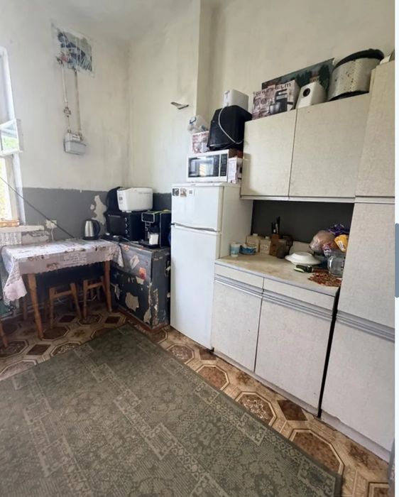 Продається цегляний будинок у центрі смт Рокитне
