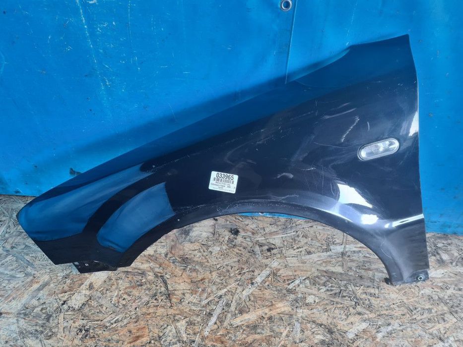 VW PASSAT B5 LIFT BŁOTNIK PRZÓD LEWY