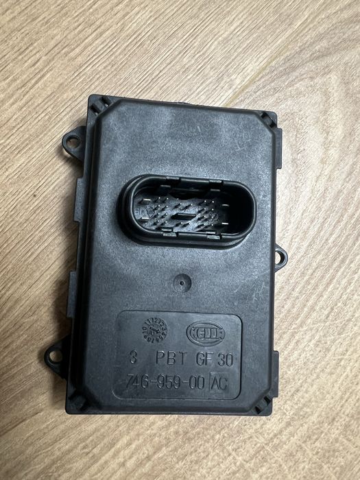 Блок керування адаптивним освітленням AFS VAG Hella 8U0941329 оригінал