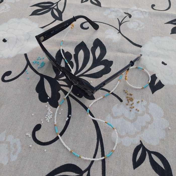 Segura óculos azul & branco