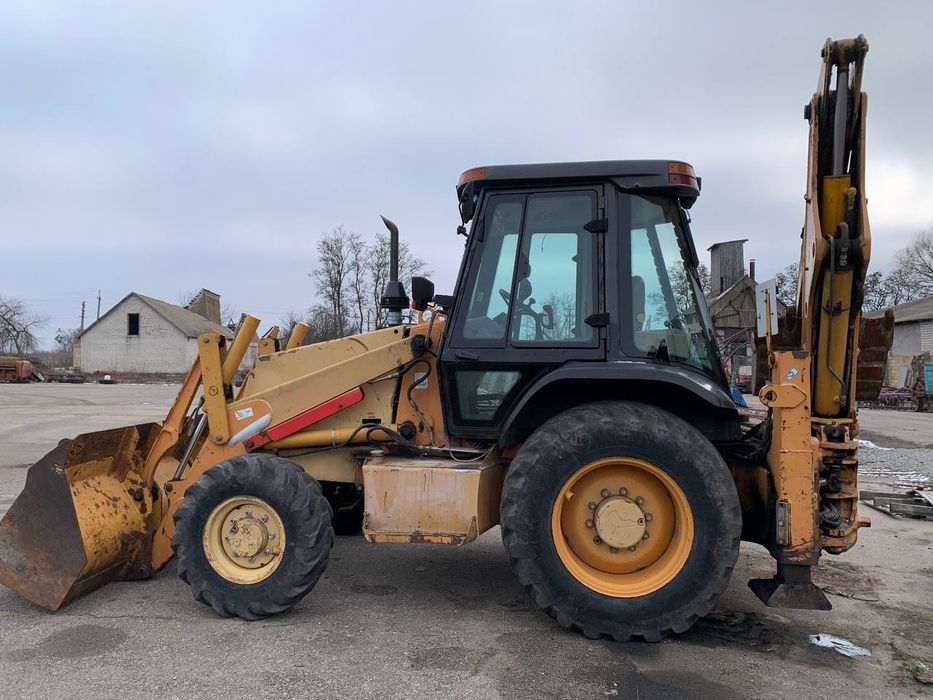 Case 580SM екскаватор навантажувач