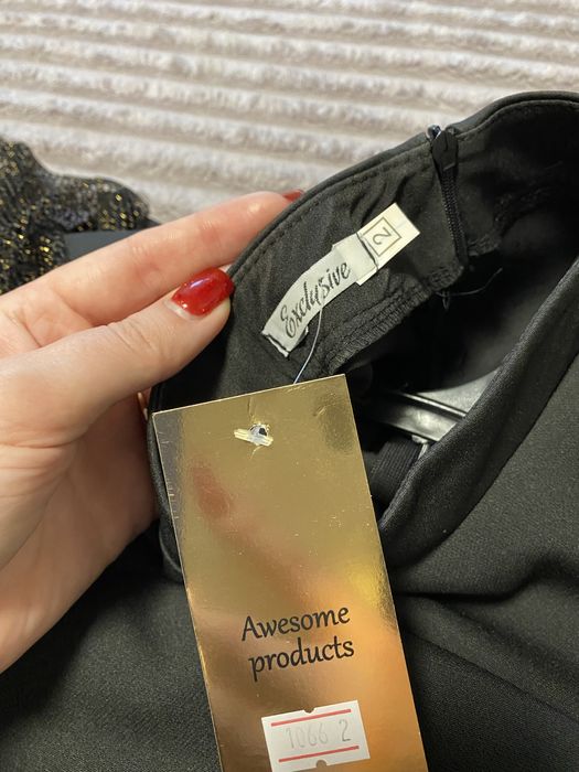 Сукня з пірʼям