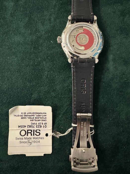 Новые  часы  Oris  623.7582.4054