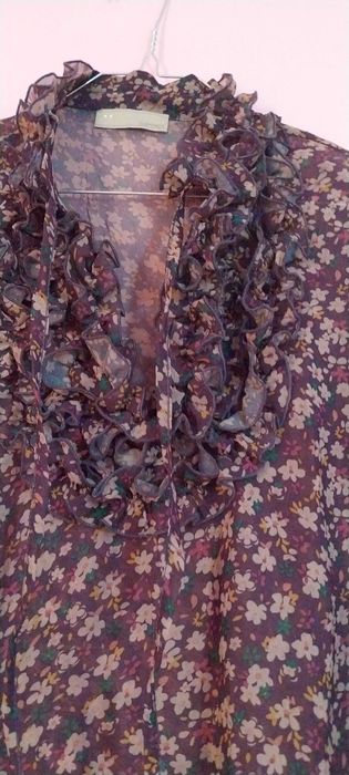 Blusa elegante com folhos