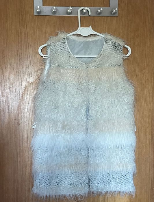 Casaco de pelo sem mangas