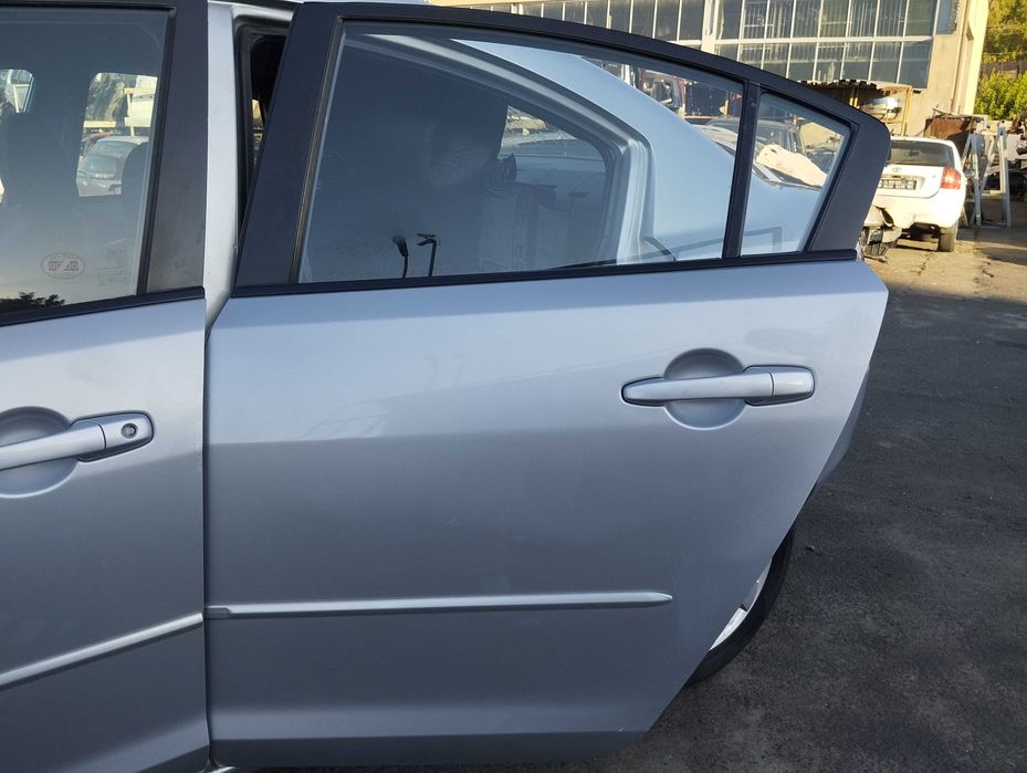 Mazda 3 BK 1.6i 4D 2005r.Drzwi tylne lewe.BP6L