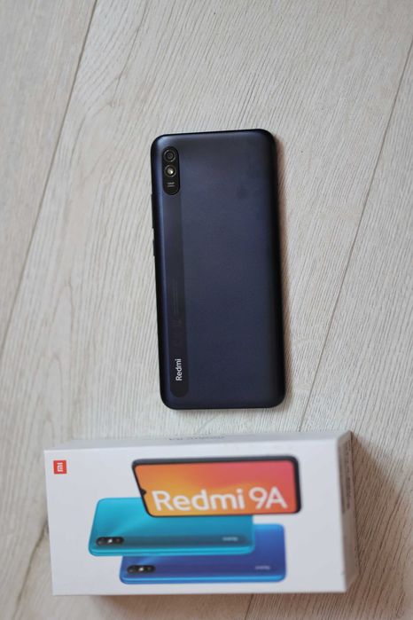 Telefon Xiaomi Redmi 9A granat 64 GB +  etui, szkło i ładowarka słuchawki jbl