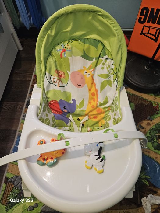 Leżaczek bujaczek dla dziecka z pałąkiem i stolikiem – bardzo dobry