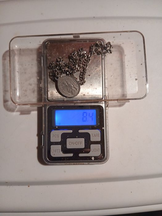 Fio de prata com medalha