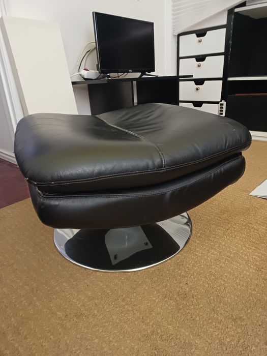 Apoio para pés giratório