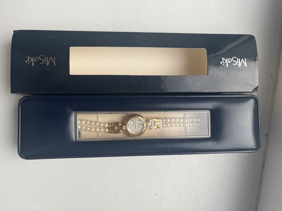 Часы с жемчугом и позолотой