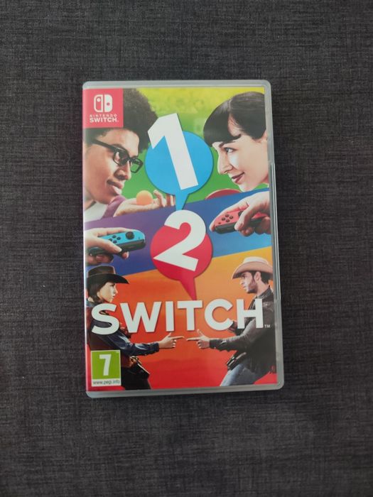 Nintendo Switch V2 (com bolsa, jogos e cartão SD)