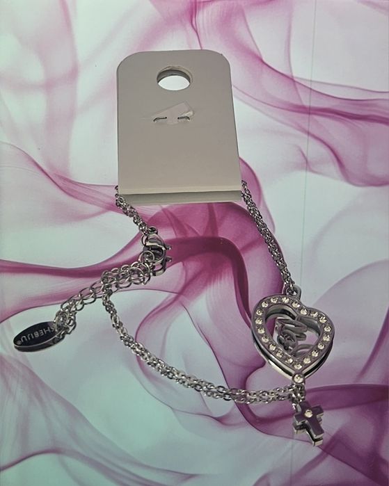 Conjunto em aço prateado colar e pulseira Nossa Senhora de Fátima