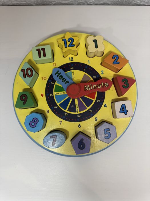 Дерев'яний годинник-сортер Melissa & Doug
