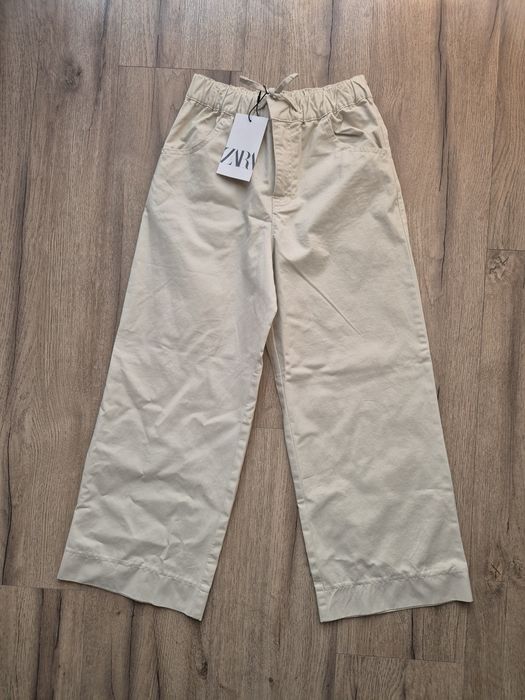 Nowe spodnie wide leg Zara beżowe 134 cm 
Gumka w pasie
Cena kata