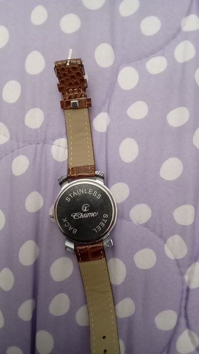 Relógio castanho homem