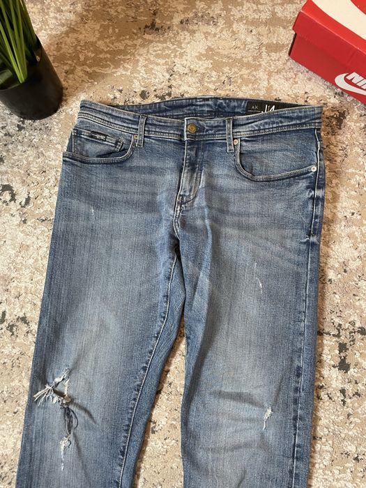 Jeansy z przetarciami meskie slim fit armani exchange selvedge
