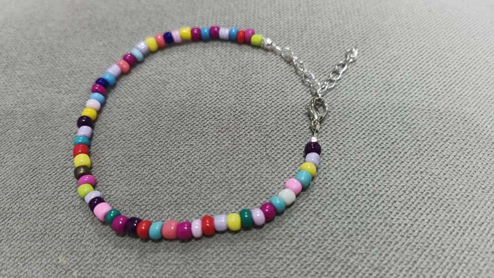 Pulseira de missangas para tornozelo