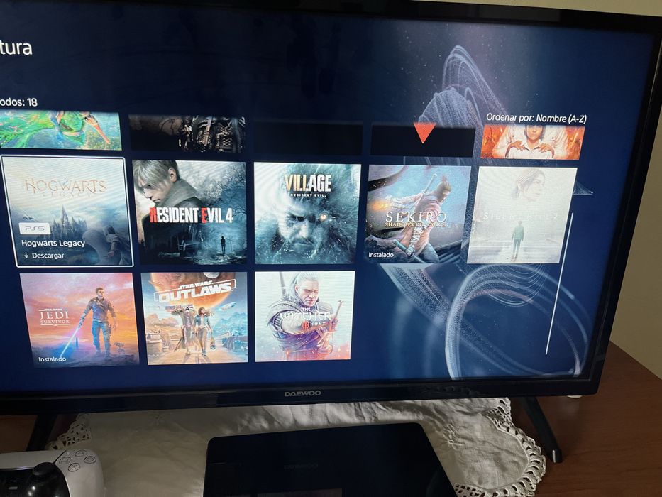 Ps5 dois comandos conta com varios jogos …… tem fifa 26